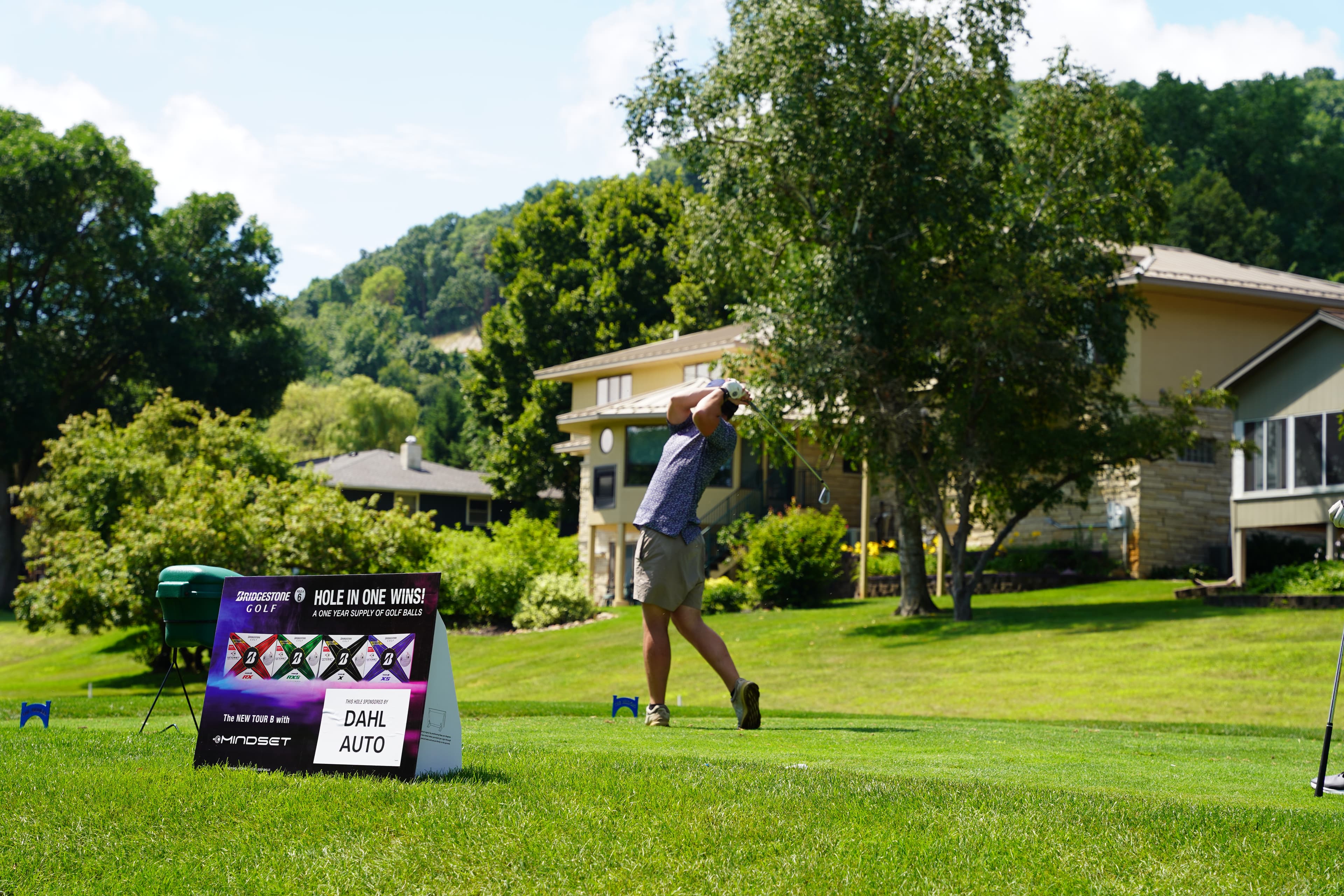 Golfer teeing off at Hole 7