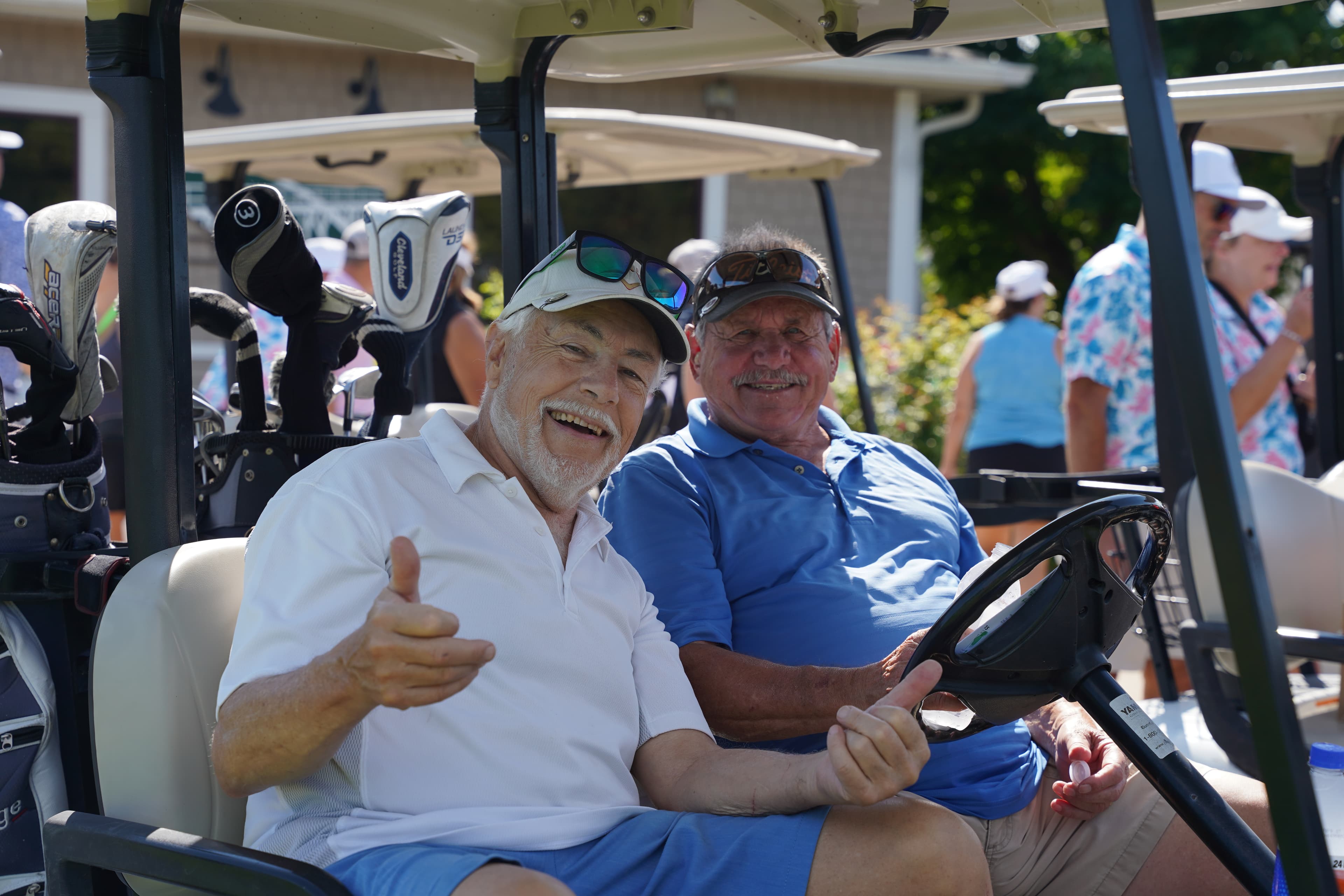 Golfers having fun in their carts
