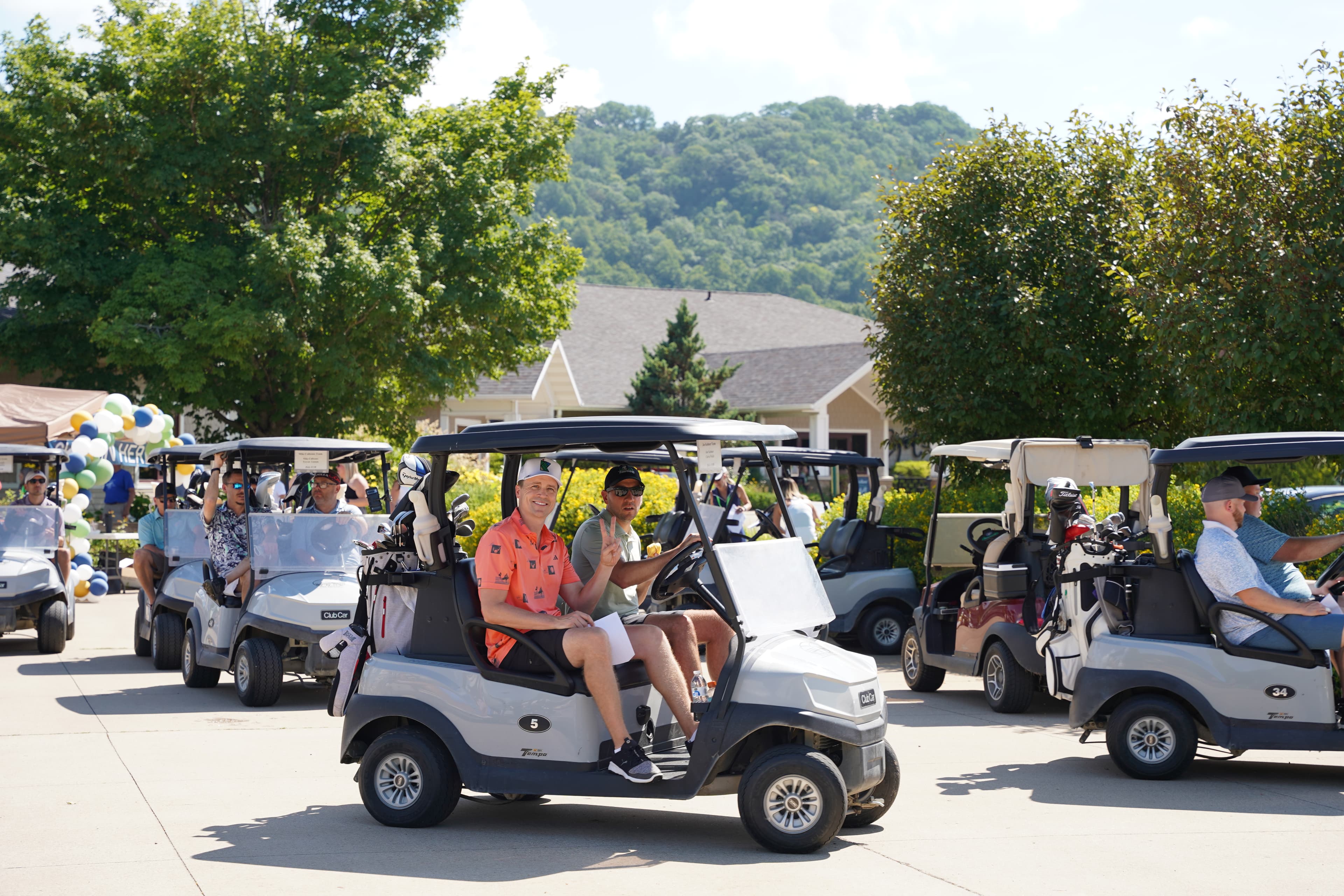 Golfers driving carts on the course