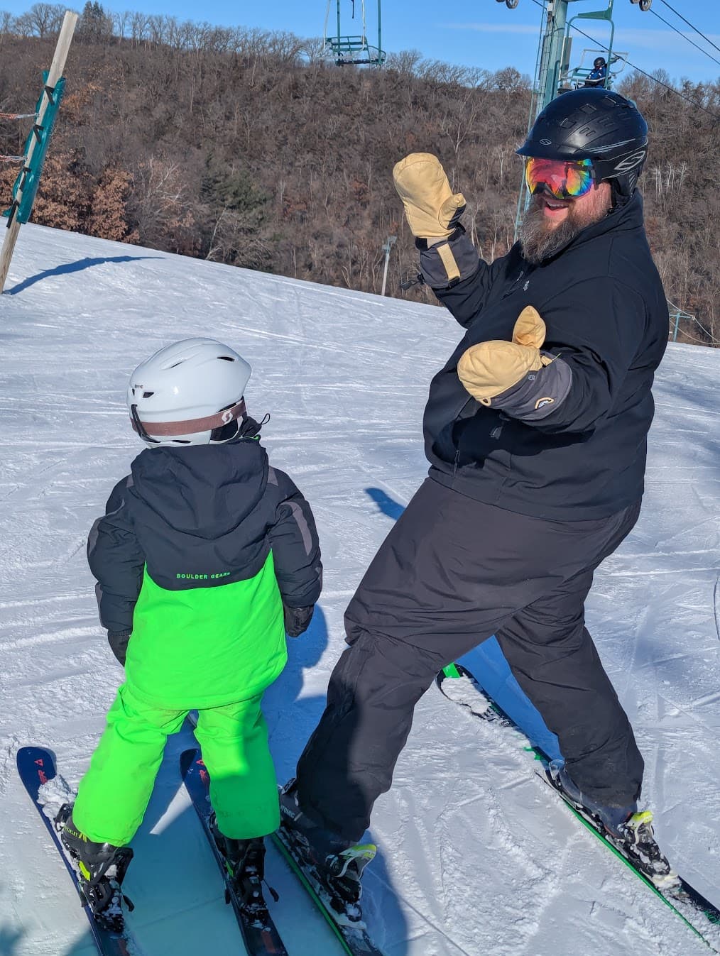 Nate skiing with his son Quentin