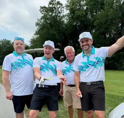 Golfers in matching shirts at the 2026 Sean Ryan Memorial Golf Classic