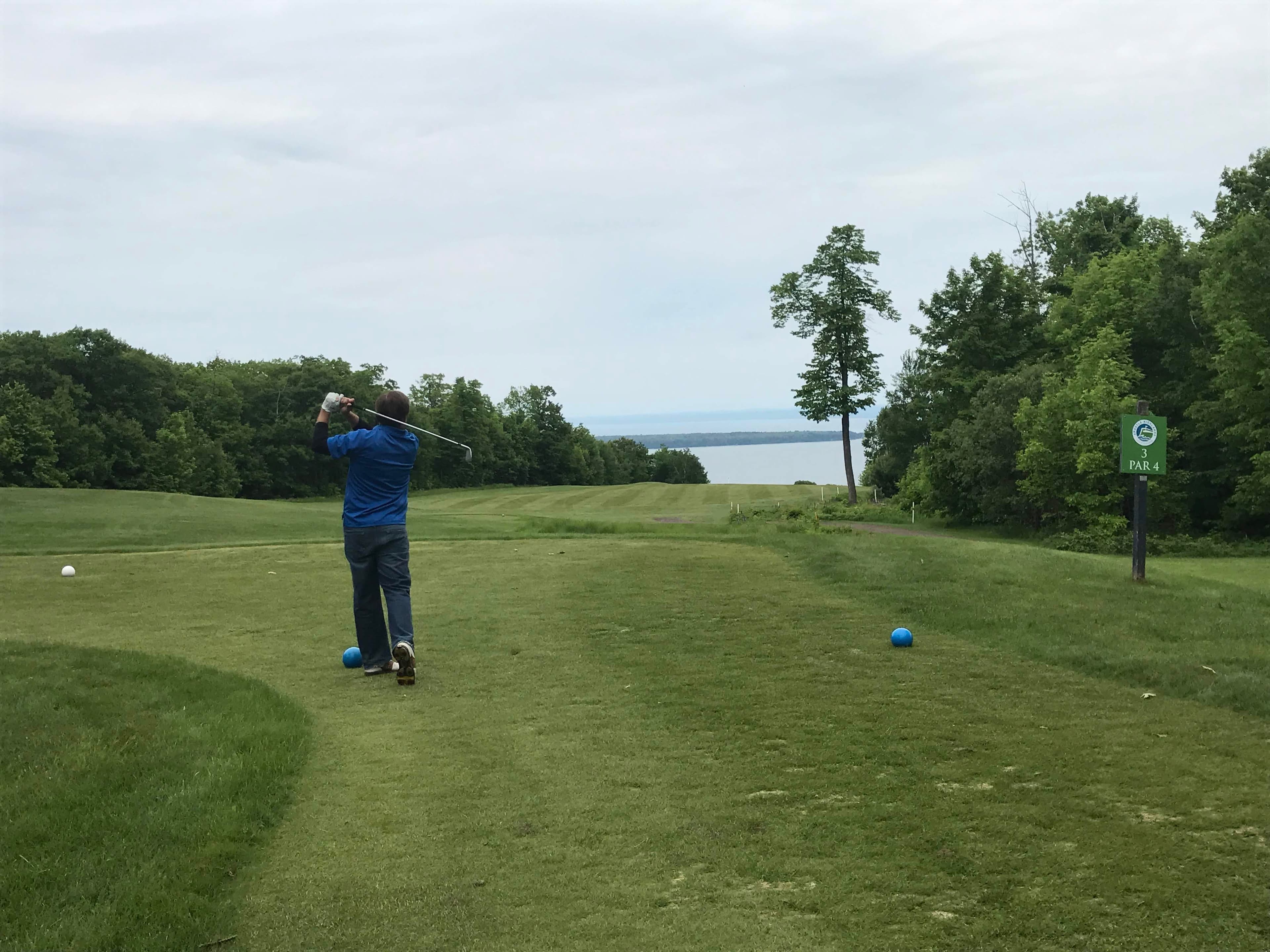 Sean Ryan golfing